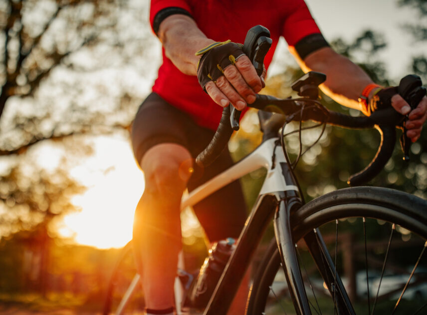 Close up of man riding bike